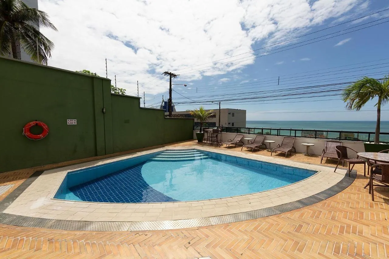 Confortável suíte com vista mar em Ponta Negra por Carpediem Natal